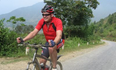 Richard Evemy Cycling on the  tour with redspokes