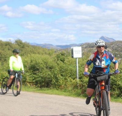 Karen & Darrell Rott Cycling on the  tour with redspokes