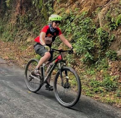 Sheelagh Evans Cycling on the  tour with redspokes