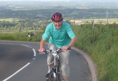 Tony Duckworth Cycling on the  tour with redspokes
